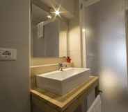 In-room Bathroom 7 Tramura Guest House