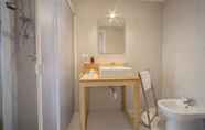 In-room Bathroom 6 Tramura Guest House