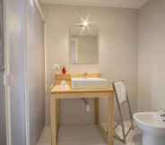 In-room Bathroom 6 Tramura Guest House