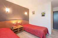 Phòng ngủ Hotel Les Trois Marchands