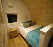 Kamar Tidur 3 Southwell Retreat Glamping Pods