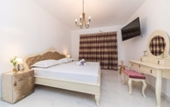 Kamar Tidur 4 Beachfront Villa Baronessa with Pool