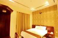 Phòng ngủ Nhat Minh Hotel