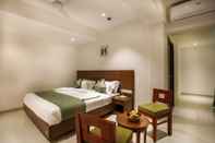 ห้องนอน Hotel Navarathna