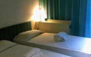 Kamar Tidur 3 Town & Country Guest House B&B