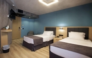 Kamar Tidur 5 Redstone Hotel