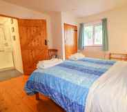 Bedroom 2 Quiet Waters Cottage