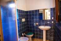 In-room Bathroom FANTASTICO POSADA LEF01