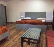 Kamar Tidur 4 Corbett Symphony Resort