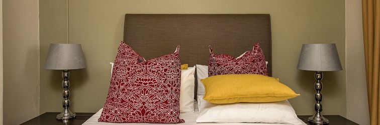 ห้องนอน Alpha Lux Apartments