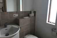 Phòng tắm bên trong Guesthouse Skógafoss