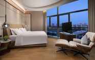 Bedroom 2 Ramada by Wyndham Hengyang Zhengxiang