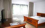 Bedroom 7 Pension Karlsbad am Waldrand