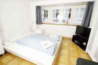 Bedroom ZH Niederdorf I - Hitrental Apartment