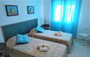 Bedroom 6 1C Praia Mar Sol by Casas & Papéis