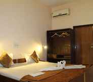Phòng ngủ 7 Tigers Villa Resort Bandhavgarh