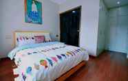 Kamar Tidur 7 4 Seasons Big Family 3 Queen Beds & High Rise View