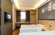 Bedroom 6 Wenxin Hotel Gangding