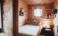 Kamar Tidur 6 Log Cabin at White River