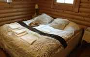 Kamar Tidur 3 Log Cabin at White River