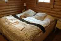 Kamar Tidur Log Cabin at White River