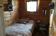 Kamar Tidur 5 Log Cabin at White River