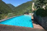 Swimming Pool Oliveto Medieval Setting