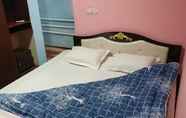 Kamar Tidur 7 Fayz Plaza Hotel