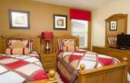Bedroom 4 Luxurious 6 Bedroom 4 Bath Villa in Windsor Hills Resort