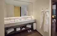 In-room Bathroom 6 Boeira Garden Hotel Porto Gaia, Curio Collection by Hilton