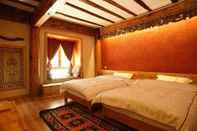 Bedroom Tibetan-style Courtyard Hotel