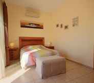 Bedroom 3 Sunny 3BR Villa w/ Endless Views & Heated Pool - Walk to Beach & Dining