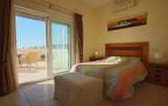 Bedroom 2 Sunny 3BR Villa w/ Endless Views & Heated Pool - Walk to Beach & Dining