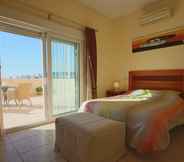 Bedroom 2 Sunny 3BR Villa w/ Endless Views & Heated Pool - Walk to Beach & Dining