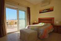 Bedroom Sunny 3BR Villa w/ Endless Views & Heated Pool - Walk to Beach & Dining