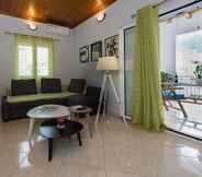 Ruang Umum 7 Thano's Stylish Flat, Just 150m To The Beach