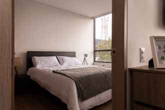 Bedroom 4 Edificio Rigel by Nomad Guru