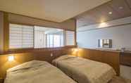 Bedroom 7 Mikazuki Sea-Park Hotel Katsuura