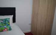 Bedroom 5 Luxury Apartment - Central Cardiff