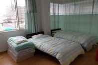 Kamar Tidur Guest House Poseidon