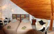 ห้องนอน 4 Chambres et table d'hôtes La Combette