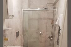 ห้องน้ำภายในห้อง Rebu Suites