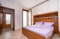 Bedroom Residence Smith - Fronte Mare 1 Piano 4B