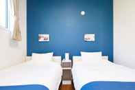 ห้องนอน E-horizon Resort Condominium Nago A