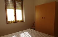 Bedroom 7 Appartamenti Fronte Mare