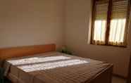 Bedroom 5 Appartamenti Fronte Mare