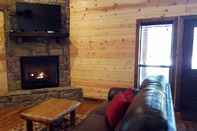 Common Space Ace in the Hole Cabin in the Wood With Hot Tub and Fireplace by Redawning