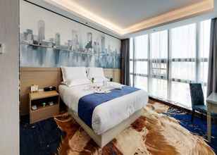 Kamar Tidur 4 W Kardon Hotel