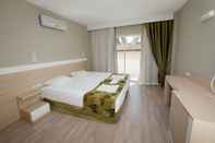 Kamar Tidur Seaden Sweet Park Hotel