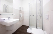 In-room Bathroom 6 VR-Serviced Apartments Obergeis